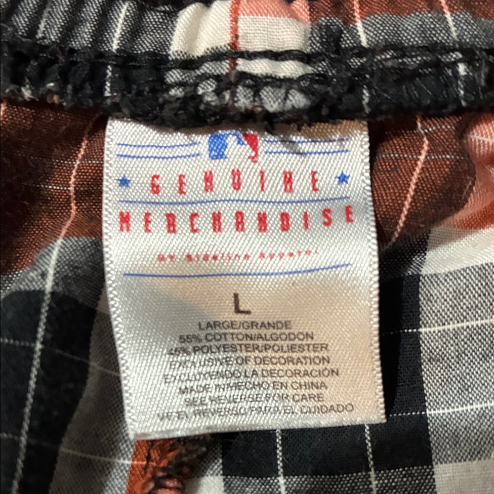 Genuine Merchandise Black and Orange Plaid Shorts
